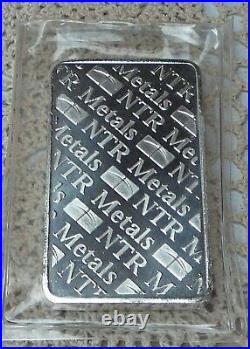 10oz. 999 Fine Solid Silver Bar. In Factory Sealed plastic pouch H