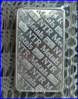 10oz. 999 Fine Solid Silver Bar. In Factory Sealed plastic pouch K