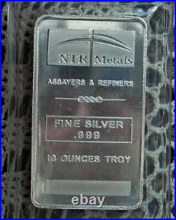 10oz. 999 Fine Solid Silver Bar. In Factory Sealed plastic pouch K