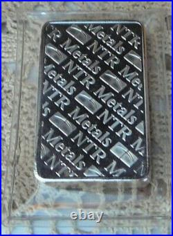 10oz. 999 Fine Solid Silver Bar. In Factory Sealed plastic pouch T