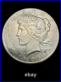 1928 Peace Silver Dollar. Key Date. Solid XF Detail. Rare Philadelphia Issue