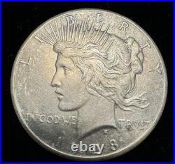 1928 Peace Silver Dollar. Key Date. Solid XF Detail. Rare Philadelphia Issue