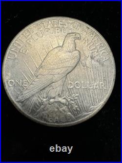 1928 Peace Silver Dollar. Key Date. Solid XF Detail. Rare Philadelphia Issue