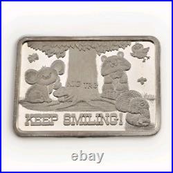 1977 Keep Smiling Greathouse Productions 1oz. 999 Vintage Square Silver Bar