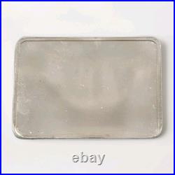 1977 Keep Smiling Greathouse Productions 1oz. 999 Vintage Square Silver Bar