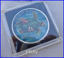 1 oz. MORTUGA #4 Zombucks Colorized World Series round. 999 fine silver