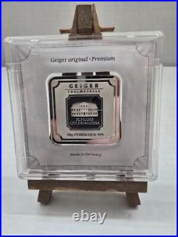 50 gram. 999 Silver Square Geiger Edelmetalle Encapsulated in Assay UV Security