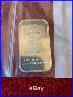 (5) Buffalo 1oz Troy. 999 Fine Solid Silver Coins & (2) 1oz Liberty Bell Bars