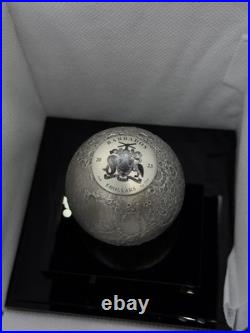 A spherical solid silver coin dedicated to Earth s satellite, the Moon