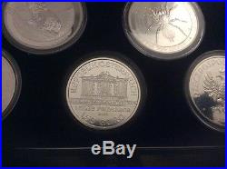 Collection of 10 Solid silver bullion coins with cases and display box