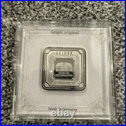 Geiger Edelmetalle Silver Bar 1oz Square in Plastic Assay Capsule Some Toning