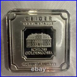 Geiger Edelmetalle Silver Bar 1oz Square in Plastic Assay Capsule Some Toning Geiger Edelmetalle Silver Bar 1oz Square in Plastic Assay Capsule Some Toning