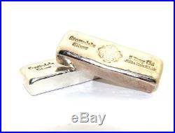 Pair of solid silver ingots, fine purity 0.999+, 5 troy Oz each