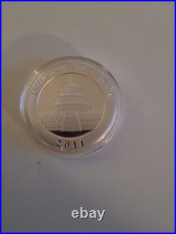The 2011 Solid Silver 10 Yuan Chinese Panda Coin 1oz Fine 999 Silver In Capsule