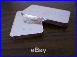 Two Heraeus 250g fine solid silver bars, half a kilo of silver in total