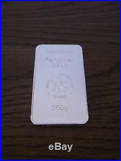 Two Heraeus 250g fine solid silver bars, half a kilo of silver in total