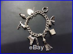 Vintage Chunky Solid Silver bracelet with beautiful Vintage Solid Silver charms