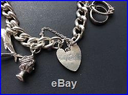 Vintage Chunky Solid Silver bracelet with beautiful Vintage Solid Silver charms